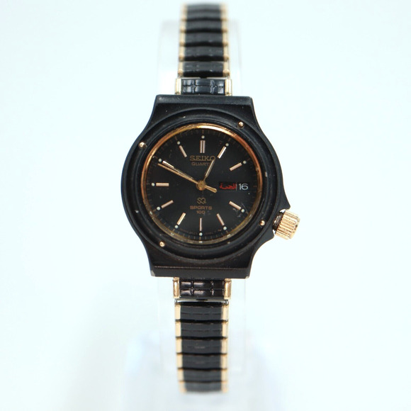 Vintage Womans Seiko SQ Sports 100 Watch Black Gold Arabic 2A23-0069 New Battery - Picture 1 of 16